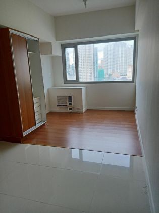 Semi Furnished Studio Unit at Eton Tower Makati for Rent