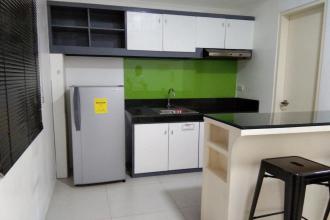 1BR Minimally Furnished Unit with Balcony at Acacia Escalades