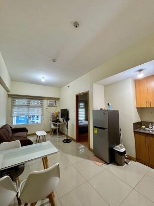 Fully Furnished 1 Bedroom Unit at Trion Towers for Rent