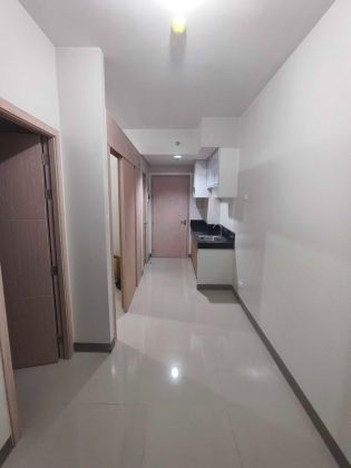 Semi Furnished 2 Bedroom Unit at Charm Residences for Rent