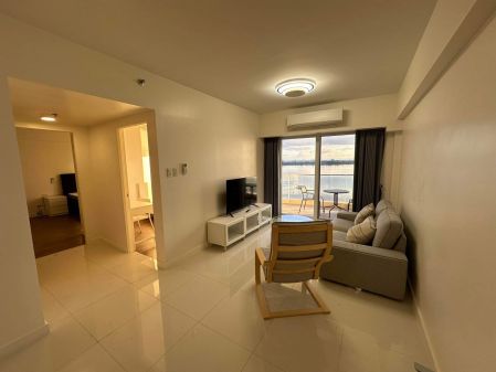 Fully Furnished 2 Bedroom Unit with Maid's room and Parking slot 