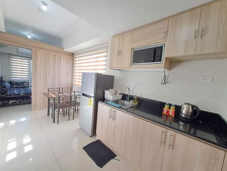 Cozy 2BR Condo with Balcony in Field Residences Paranaque