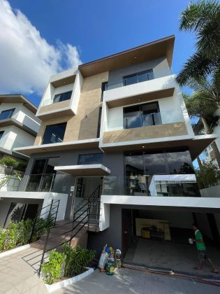 Semi Furnished 5 Bedroom House at McKinley Hill Village for Rent