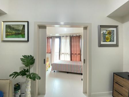 1BR Fully Furnished Unit with Balcony at KL Tower  Legazpi Villag