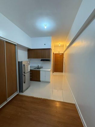 Semi Furnished Studio Unit at Eton Tower Makati for Rent