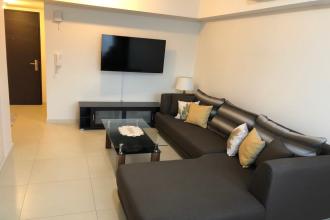 Fully Furnished 1BR Corner Unit with Balcony in The Lerato Makati