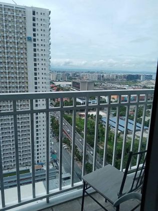 Fully Furnished 1BR with Balcony at Breeze Residences